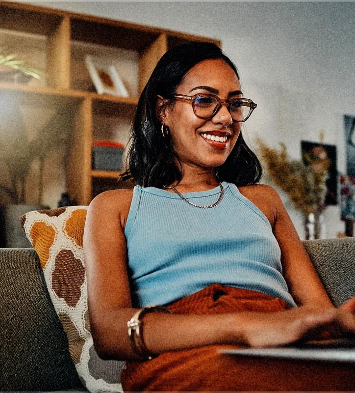 A person managing daily finances on a laptop.