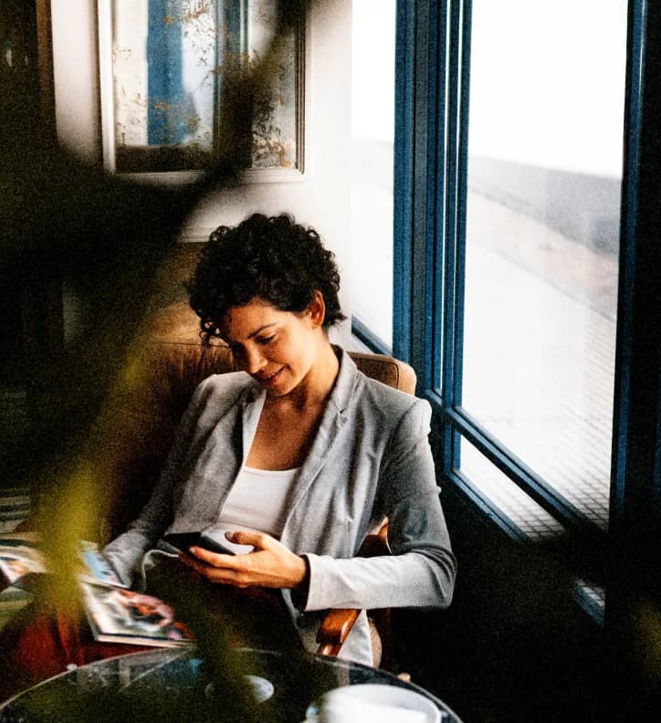 A new customer opening an account on a mobile phone.